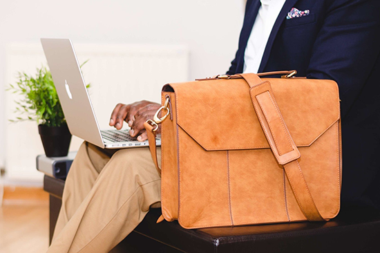 pexels-photo-936081-businessman-briefcase-laptop